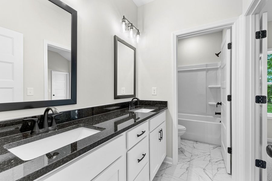 Furnished interior view inside a new home in Golfview, Thomaston (Image 10).