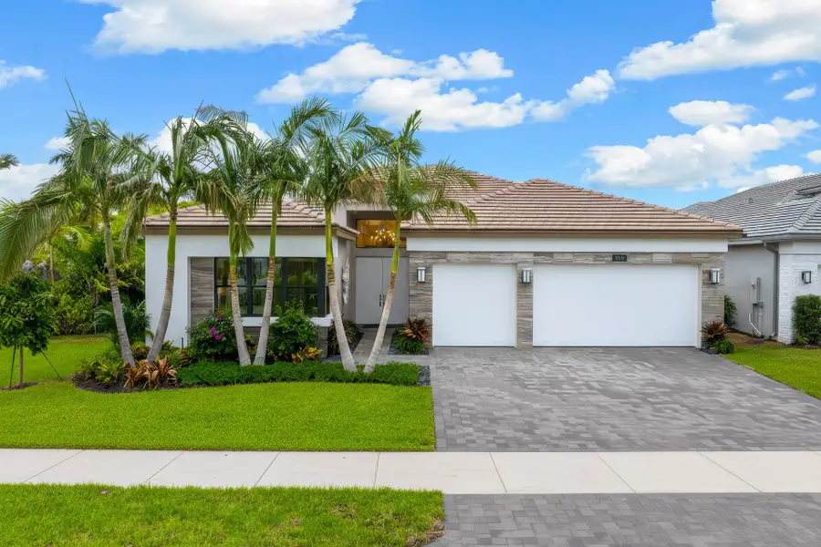 Representative exterior photo of a completed home built from the Julia by GL Homes in Valencia Del Mar (55+), Boynton Beach, FL (Image 1). Representative exterior photo of a completed home built from the Julia by GL Homes in Valencia Del Mar (55+), Boynton Beach, FL (Image 1).