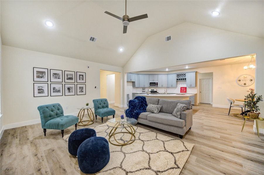 Spacious living room with open-concept design, perfect for entertaining and relaxation.