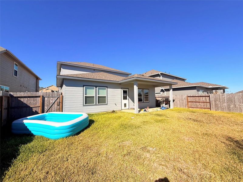 Exterior details and patio area of a home in Pine Lake Cove - Premier Series, Montgomery (Image 4).