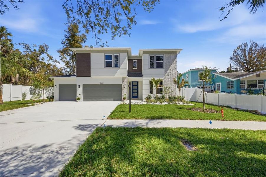 Front exterior of a new home in , Tampa, FL, highlighting curb appeal (Image 29).