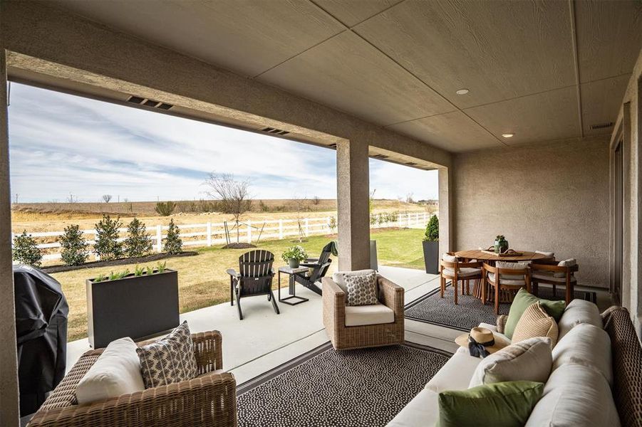 Exterior details and patio area of a home in Robson Ranch Texas, Denton (Image 23).