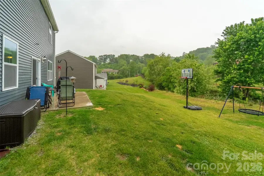 Exterior details and patio area of a home in , Waynesville (Image 4).