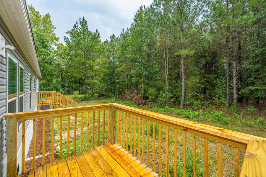 Exterior details and patio area of a home in , Cottageville (Image 26).