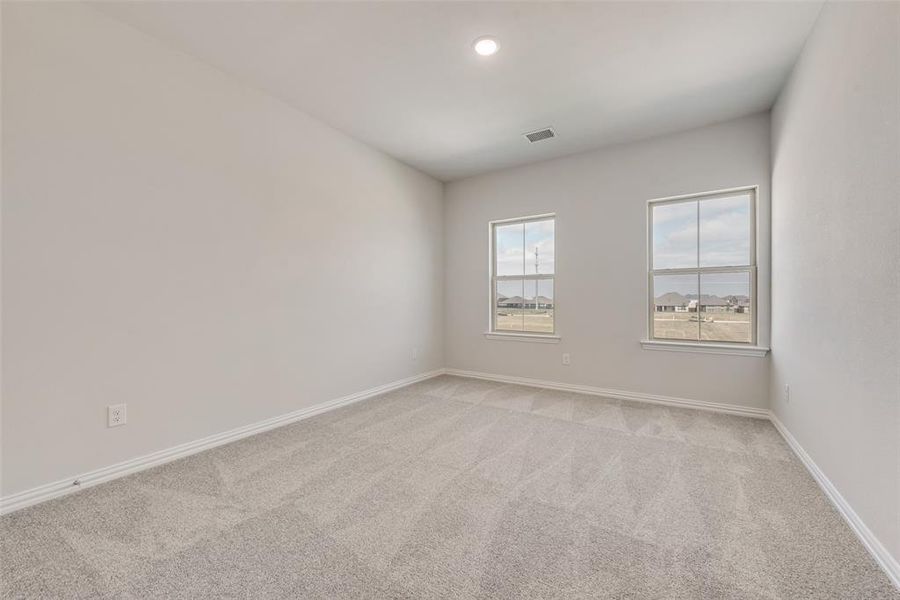 Spacious, unfurnished interior of a new home in Spiritas Ranch, Little Elm (Image 14).