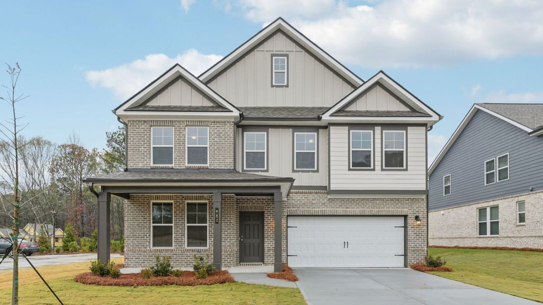 Front exterior of a new home in Hamilton Lakes, Lawrenceville, GA, highlighting curb appeal (Image 21).
