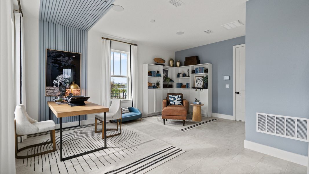Representative furnished interior of a home built from the Lantana End Unit by DRB Homes in Parkview at Hamlin, Winter Garden (Image 11).