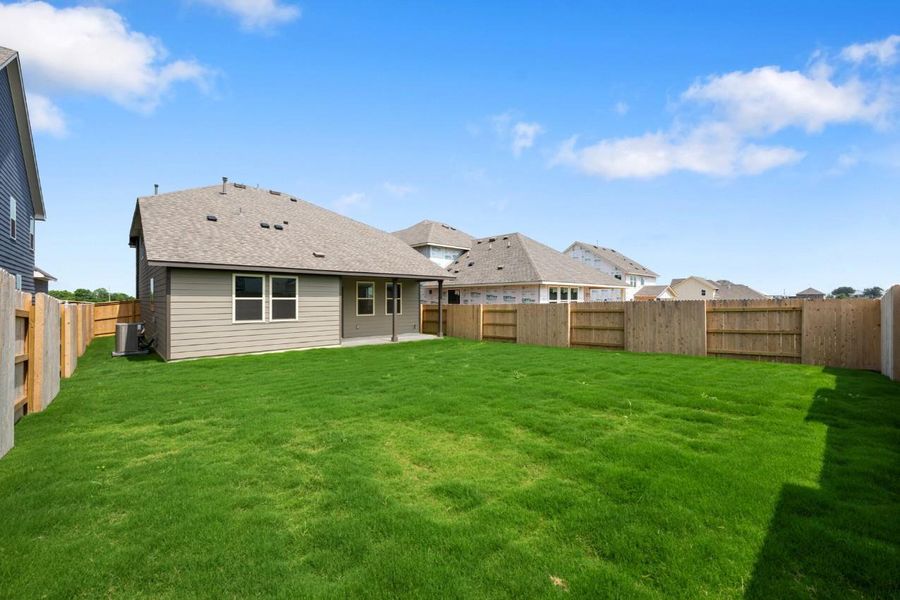 Exterior details and patio area of a home in Patterson Ranch, Georgetown (Image 26).
