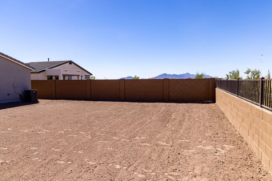 Exterior details and patio area of a home in Rancho Santa Rosa, Maricopa (Image 24).