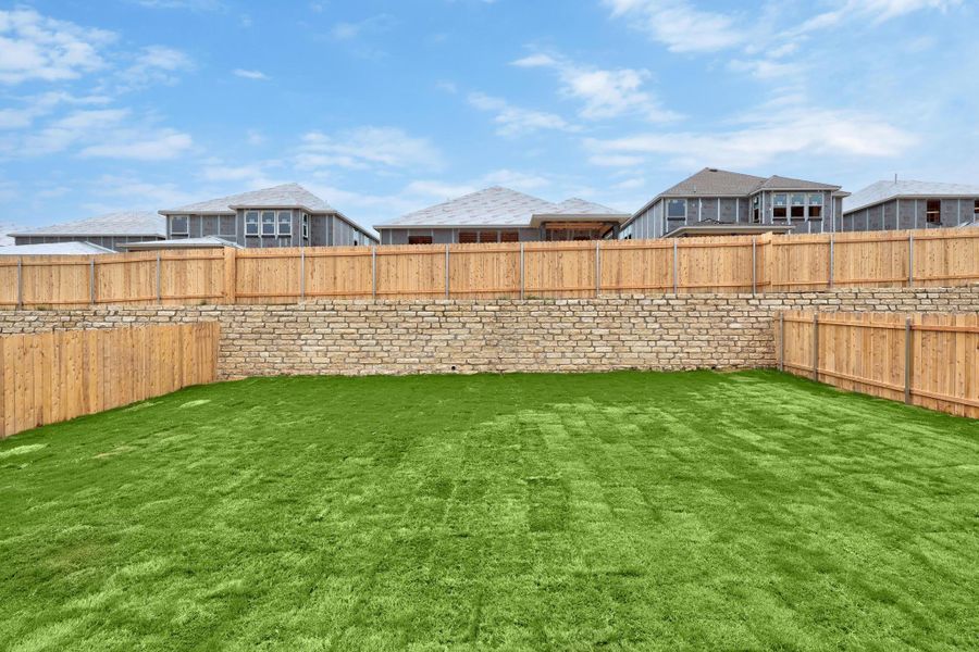 Front exterior of a new home in Salerno - Classic Collection, Round Rock, TX, highlighting curb appeal (Image 19). Front exterior of a new home in Salerno - Classic Collection, Round Rock, TX, highlighting curb appeal (Image 19).