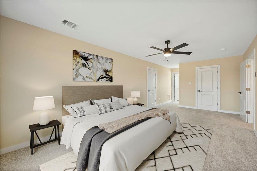 Bedroom with light carpet and ceiling fan