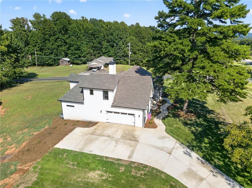 Front exterior of a new home in , Dallas, GA, highlighting curb appeal (Image 27). Front exterior of a new home in , Dallas, GA, highlighting curb appeal (Image 27).