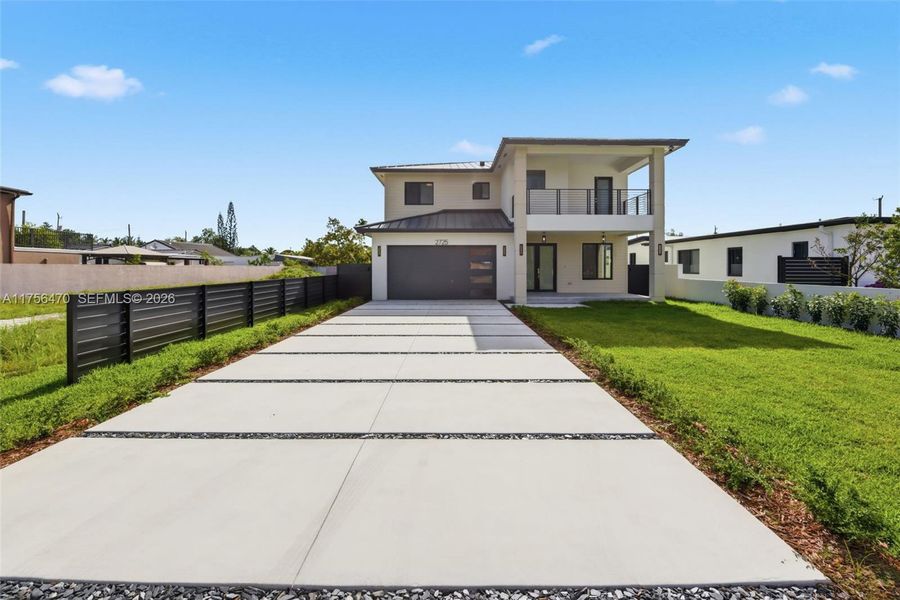 Front exterior of a new home in , Miami, FL, highlighting curb appeal (Image 22).