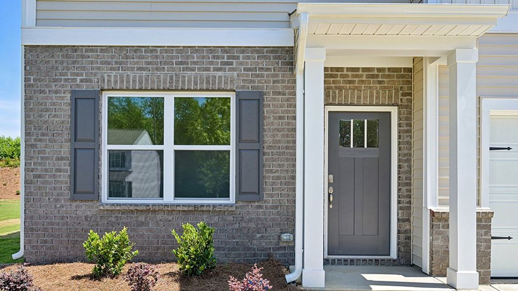 Exterior details and patio area of a home in Cross Creek, Spring Lake (Image 3). Exterior details and patio area of a home in Cross Creek, Spring Lake (Image 3).