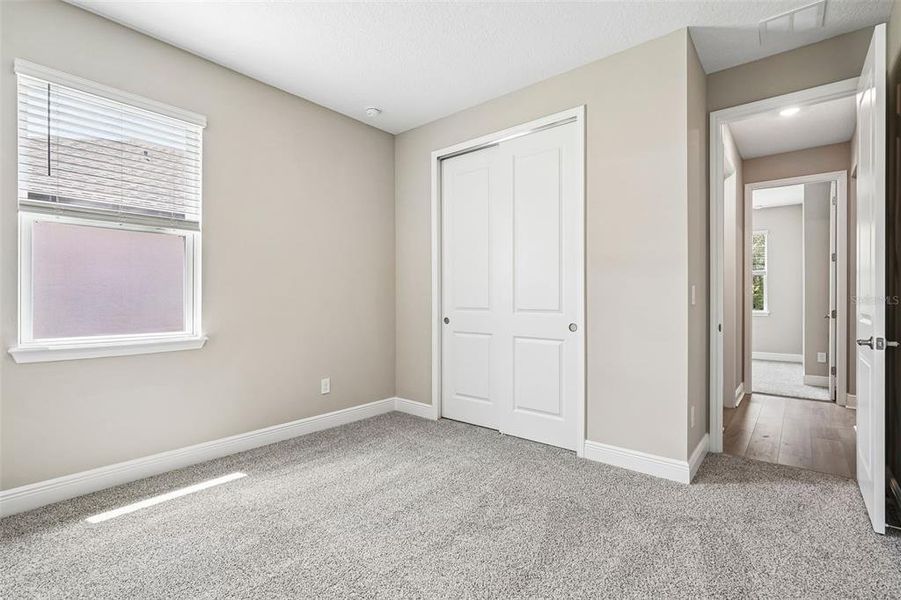 Spacious, unfurnished interior of a new home in Legends Preserve - Signature Series, Daytona Beach (Image 25).