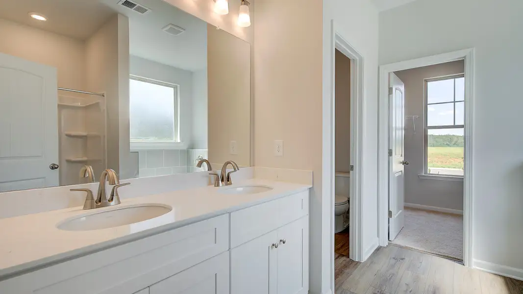 Representative furnished interior of a home built from the Meridian II - Side Entry by DRB Homes in Brighton, Locust Grove (Image 17). Representative furnished interior of a home built from the Meridian II - Side Entry by DRB Homes in Brighton, Locust Grove (Image 17).