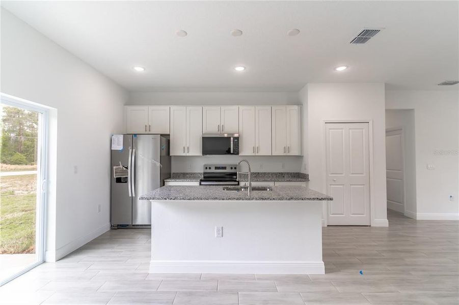 Furnished interior view inside a new home in , Ocala (Image 3).