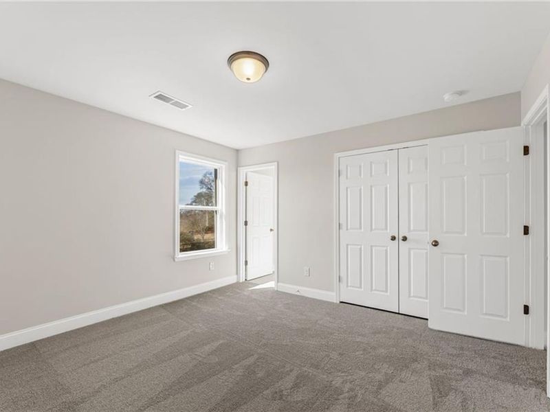 Spacious, unfurnished interior of a new home in Wehunt Meadows, Hoschton (Image 24).