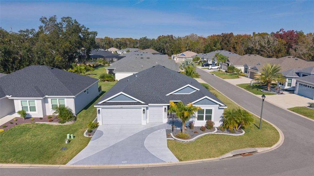 Front exterior of a new home in , The Villages, FL, highlighting curb appeal (Image 27). Front exterior of a new home in , The Villages, FL, highlighting curb appeal (Image 27).