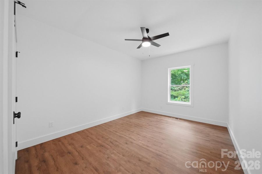Spacious, unfurnished interior of a new home in , Lenoir (Image 30).