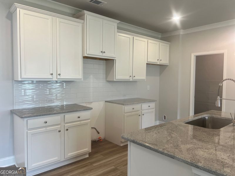 Furnished interior view inside a new home in Crofton Place Enclave, Snellville (Image 4). Furnished interior view inside a new home in Crofton Place Enclave, Snellville (Image 4).