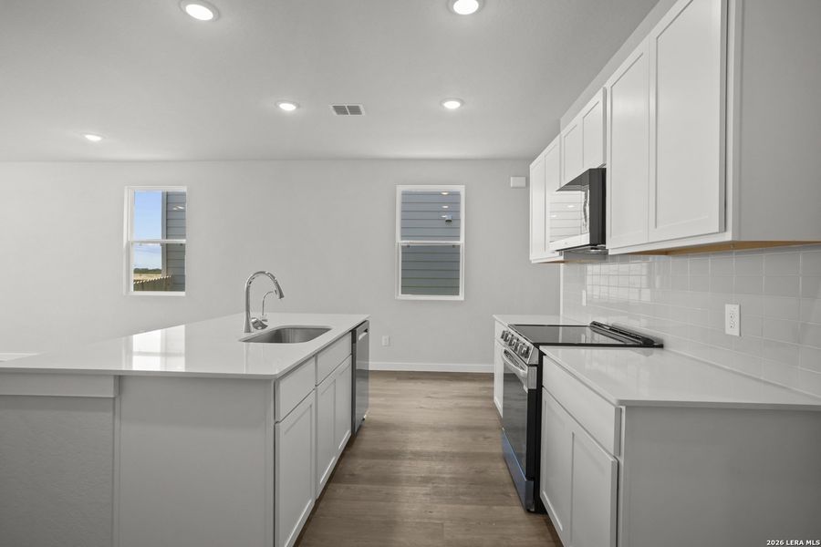Furnished interior view inside a new home in Agave, San Antonio (Image 11).