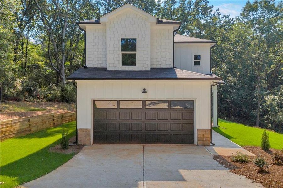 Front exterior of a new home in , Franklin Springs, GA, highlighting curb appeal (Image 26). Front exterior of a new home in , Franklin Springs, GA, highlighting curb appeal (Image 26).