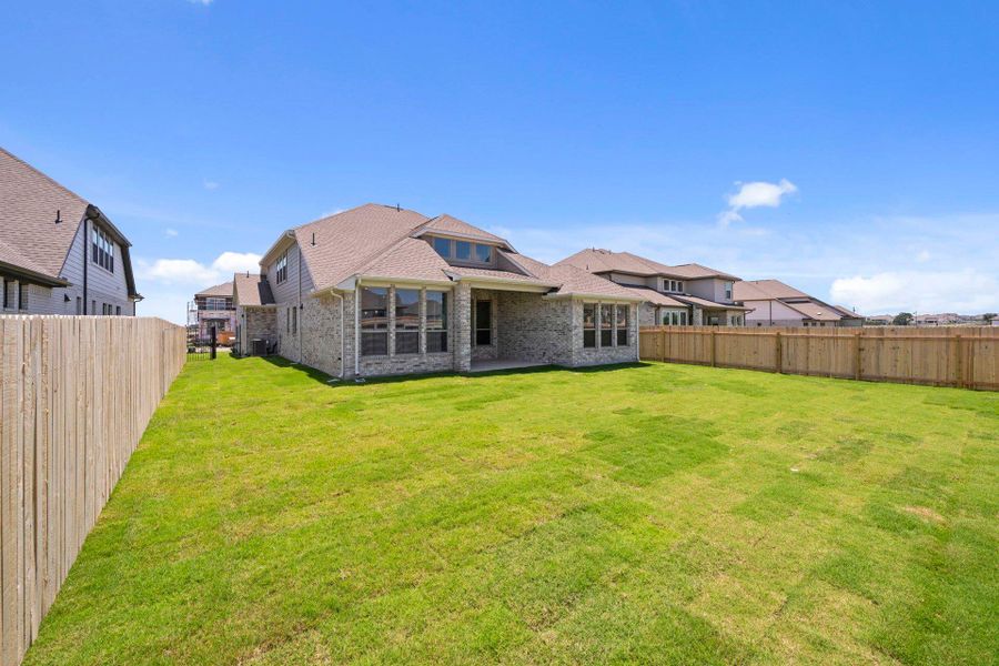 Rear of Home and Private Backyard