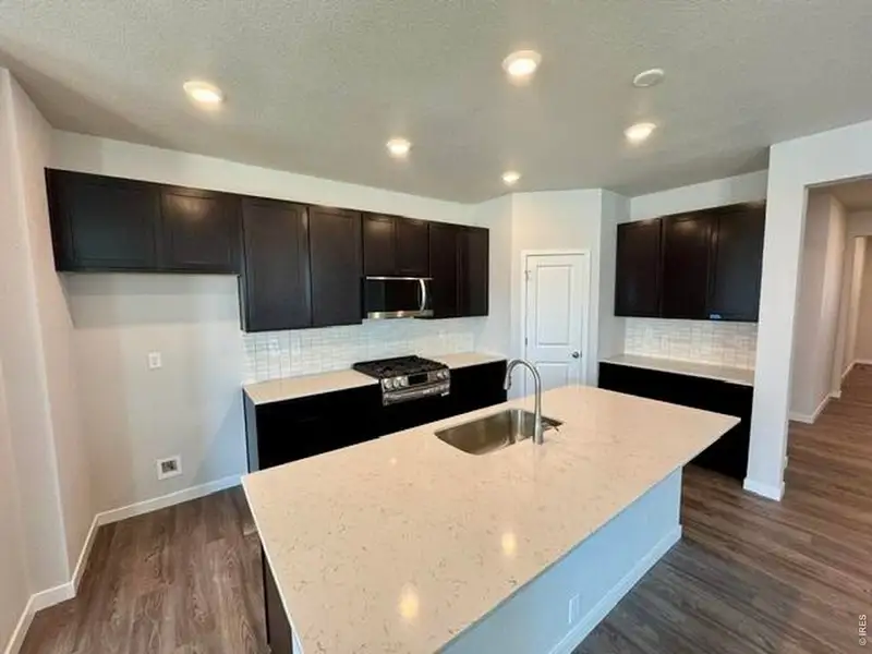 Furnished interior view inside a new home in Prairie Song, Windsor (Image 4).