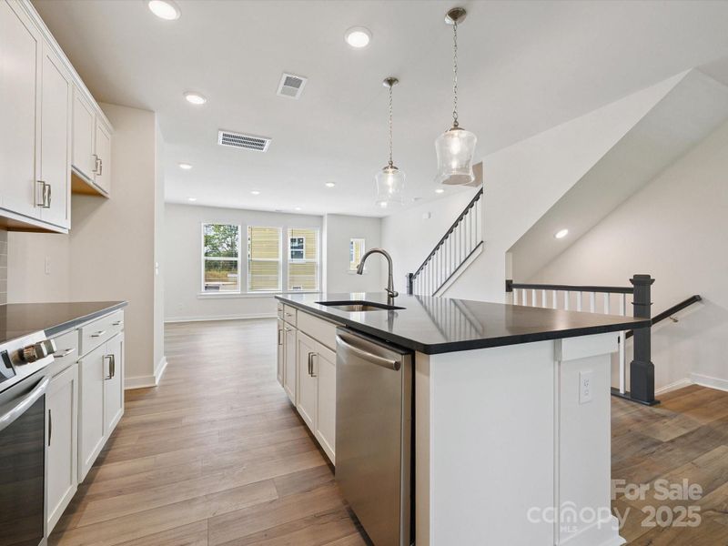 Furnished interior view inside a new home in Central Living at Craig, Charlotte (Image 9).