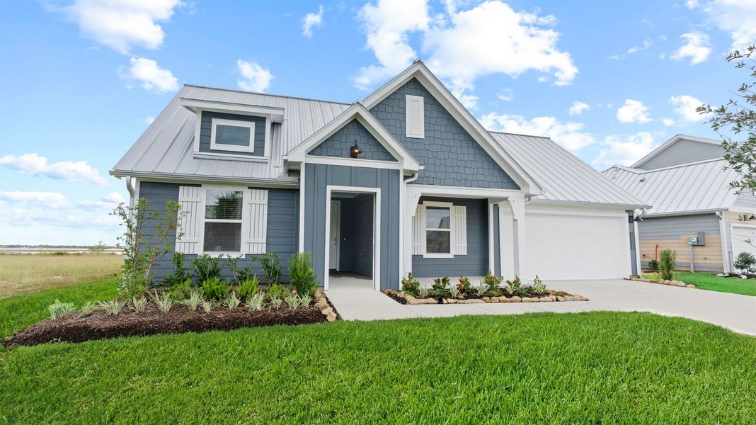 Representative exterior photo of a completed home built from the GARLAND by D.R. Horton in Grand Cay Harbour, Texas City, TX (Image 1). Representative exterior photo of a completed home built from the GARLAND by D.R. Horton in Grand Cay Harbour, Texas City, TX (Image 1).
