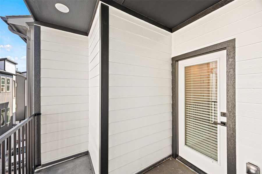 Exterior details and patio area of a home in , Houston (Image 26).