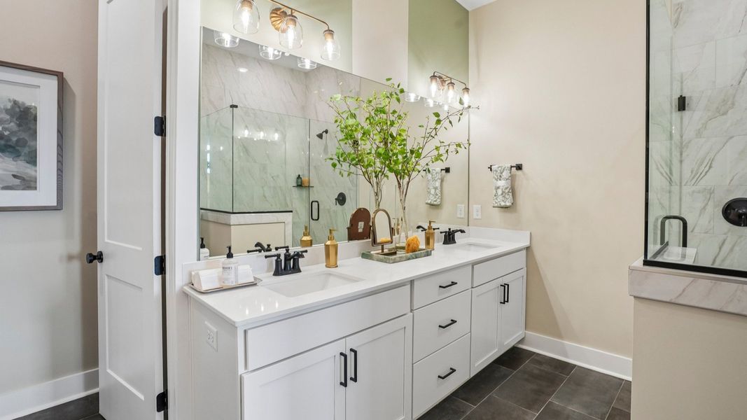 Primary bathroom with dual vanity Primary bathroom with dual vanity