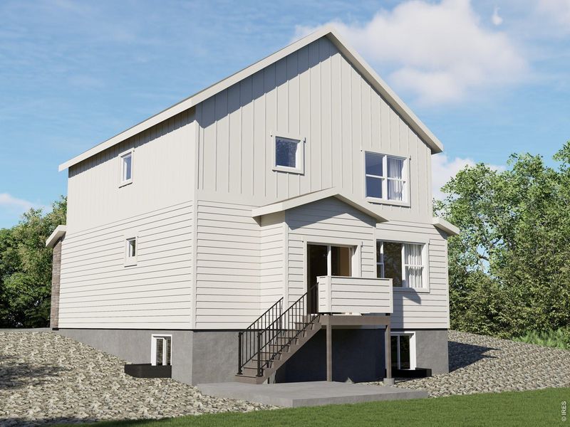 Front exterior of a new home in Wilson Commons, Loveland, CO, highlighting curb appeal (Image 7). Front exterior of a new home in Wilson Commons, Loveland, CO, highlighting curb appeal (Image 7).