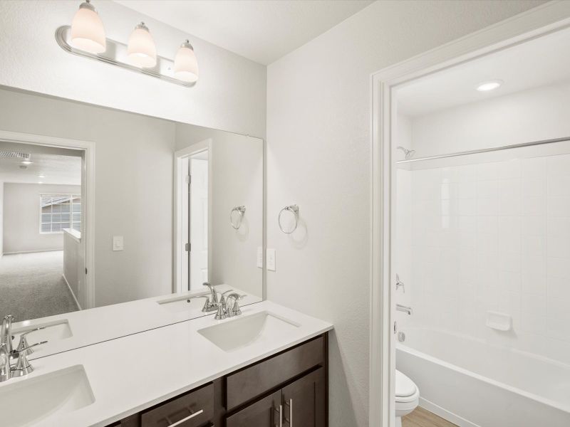 Furnished interior view inside a new home in Buffalo Highlands: The Canyon Collection, Commerce City (Image 9).