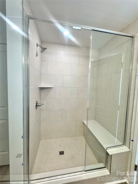 Tiled shower with bench
