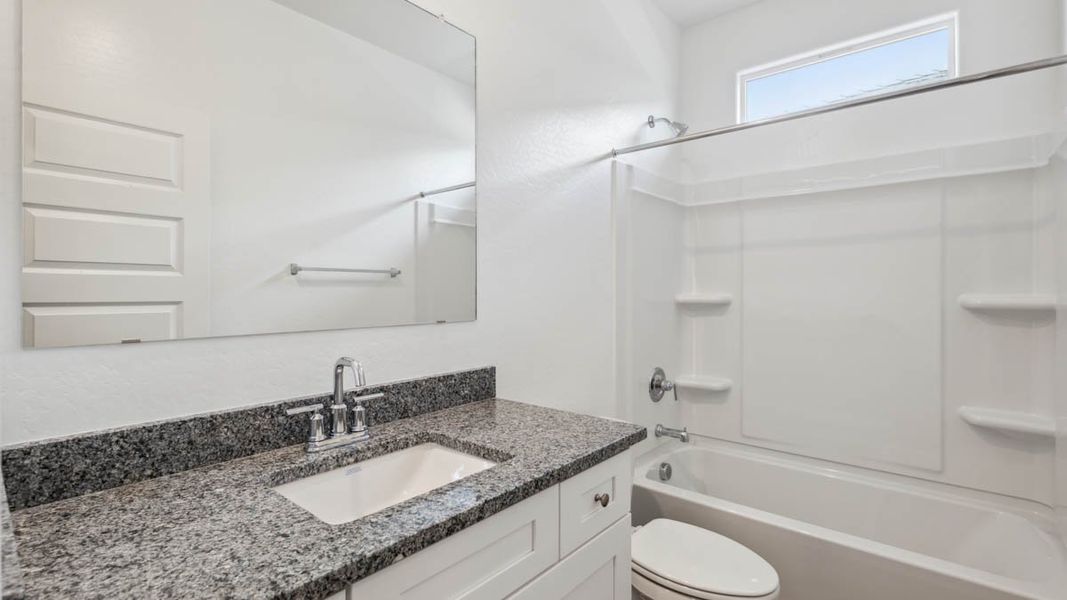 Representative furnished interior of a home built from the Puffin by D.R. Horton in Moonlight, Maricopa (Image 11).