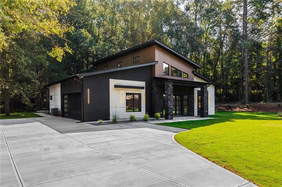 Front exterior of a new home in , Winder, GA, highlighting curb appeal (Image 30).