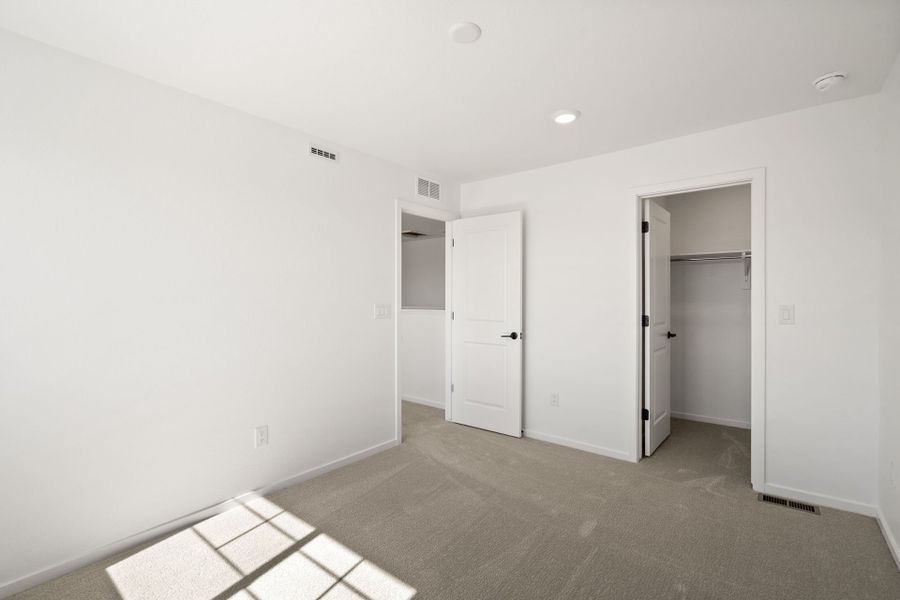 Spacious, unfurnished interior of a new home in Cordovan, Firestone (Image 13).