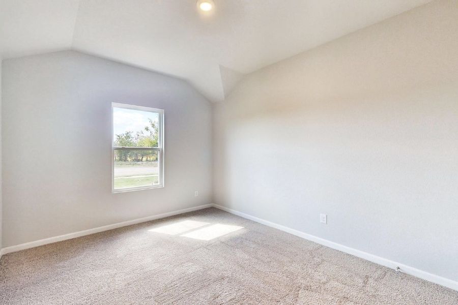 A room with a window and carpet. A room with a window and carpet.