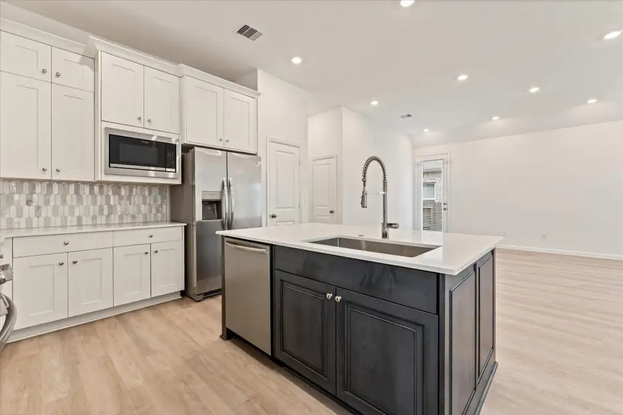 Furnished interior view inside a new home in , Conroe (Image 10). Furnished interior view inside a new home in , Conroe (Image 10).