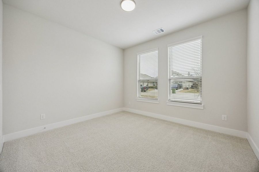 Representative unfurnished interior of a home built from the The Jason by Lillian Custom Homes in Hickory Hill, Sherman (Image 17).