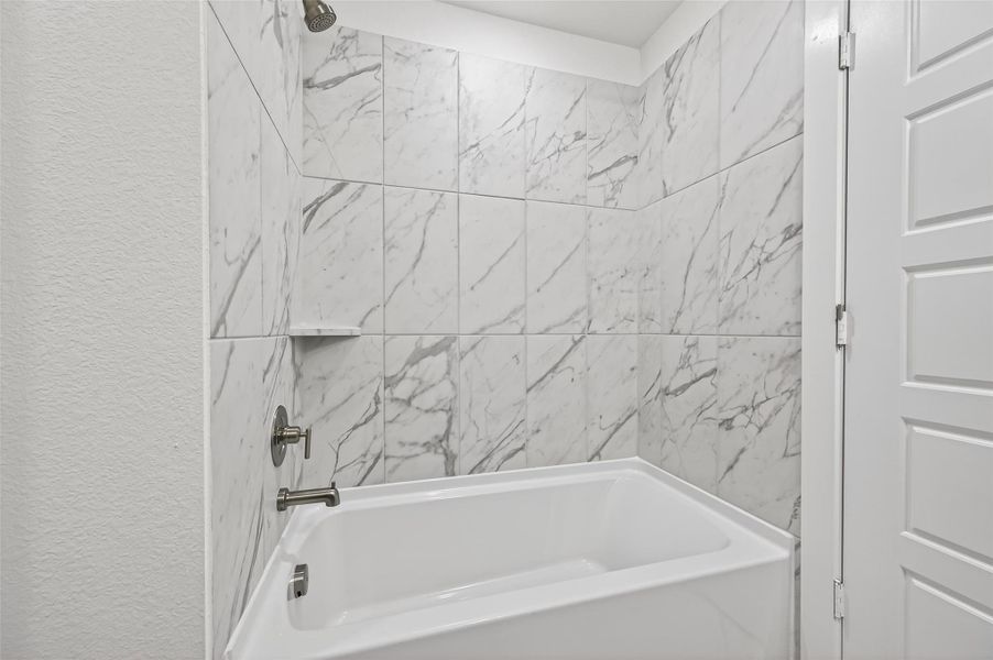 Furnished interior view inside a new home in Sorella, Tomball (Image 33).