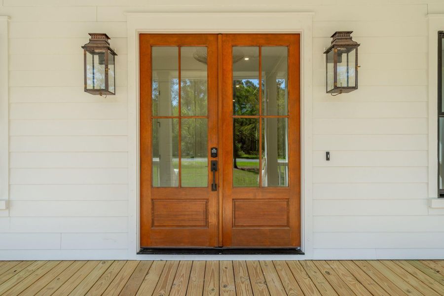 Exterior details and patio area of a home in , Johns Island (Image 38).