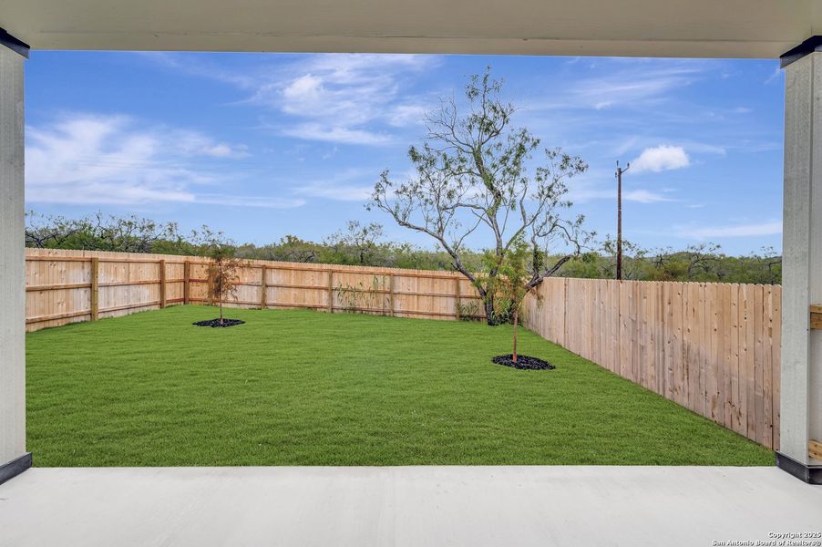 Exterior details and patio area of a home in Paloma Park, Converse (Image 28).
