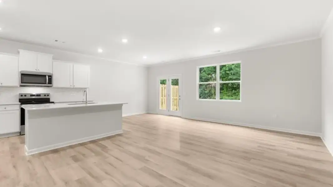 Spacious, unfurnished interior of a new home in Waypoint, Flowery Branch (Image 15).