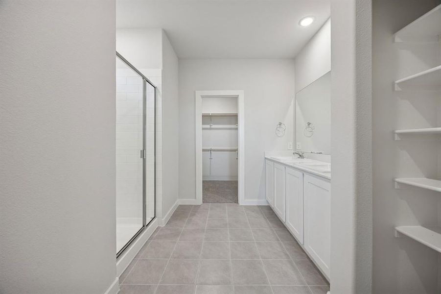 Primary Bathroom in the Oak II home plan by Trophy Signature Homes – REPRESENTATIVE PHOTO Primary Bathroom in the Oak II home plan by Trophy Signature Homes – REPRESENTATIVE PHOTO