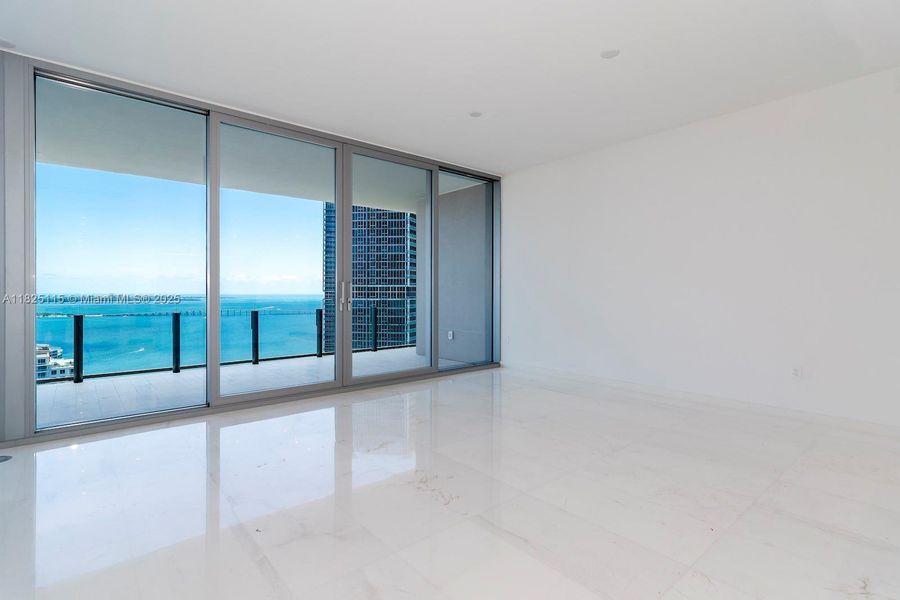 Spacious, unfurnished interior of a new home in Aston Martin Residences, Miami (Image 24).