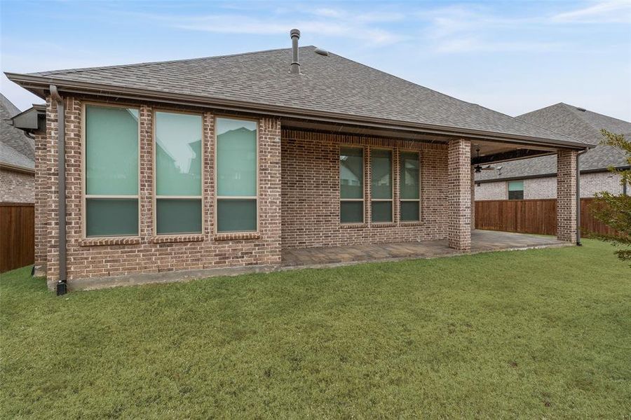 Exterior details and patio area of a home in , Aubrey (Image 15). Exterior details and patio area of a home in , Aubrey (Image 15).