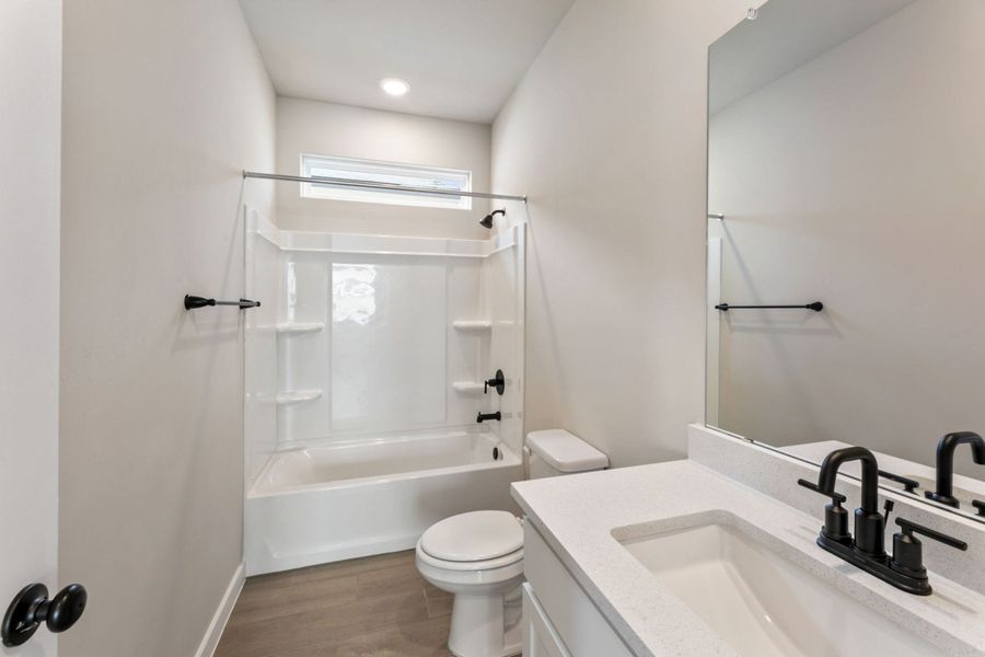Representative furnished interior of a home built from the Pecos by Hakes Brothers in Highland Ridge, New Braunfels (Image 19).